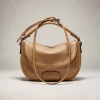 Tan leather shoulder baguette bag