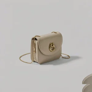 Beige mini crossbody bag with gold chain strap