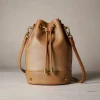 Caramel leather bucket bag with drawstring closure