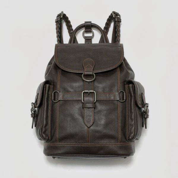 Dark brown leather backpack with flap and buckle